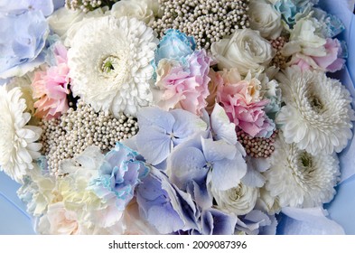 Bridal Bouquet With Blue Hydrangeas, White Roses And Rainbow Carnations