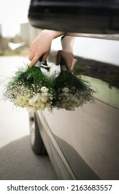 Bridal Bouquet In The Bridal Car