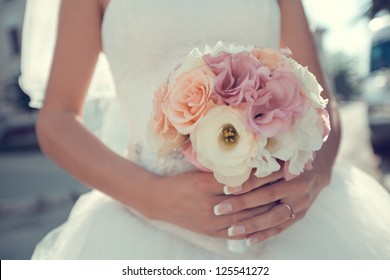 bridal bouquet of flowers in hands of the bride - Powered by Shutterstock