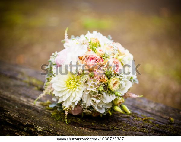 The bridal\
bouquet in the summer at the\
wedding