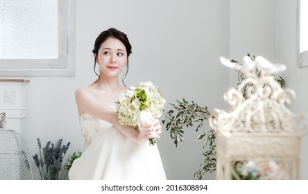 Bridal concept of young asian woman. Wedding photo.