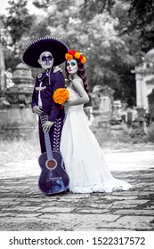 Bridal Couple With Makeup And Costumes Typical Mexican In A Cementery.