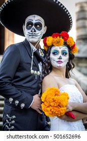 Bridal Couple With Makeup And Costumes Typical Mexican In A Cementery.