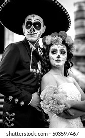 Bridal Couple With Makeup And Costumes Typical Mexican In A Cementery.