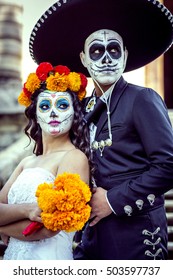 Bridal Couple With Makeup And Costumes Typical Mexican In A Cementery.