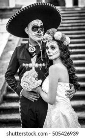 Bridal Couple With Makeup And Costumes Typical Mexican In A Cementery.