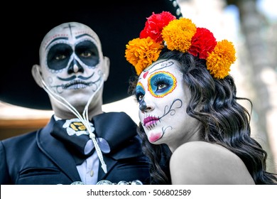 Bridal Couple With Makeup And Costumes Typical Mexican In A Cementery.