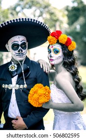 Bridal Couple With Makeup And Costumes Typical Mexican In A Cementery.