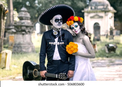 Bridal Couple With Makeup And Costumes Typical Mexican In A Cementery.