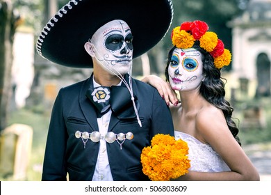 Bridal Couple With Makeup And Costumes Typical Mexican In A Cementery.