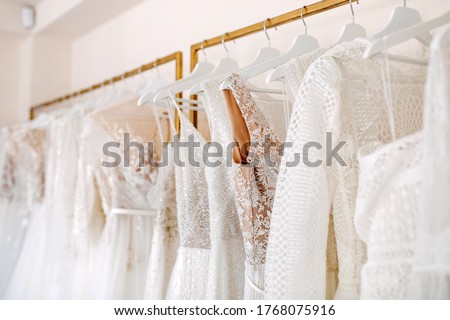 Bridal dresses collection at showroom. Luxury bridal gowns shop. Photo stock © 