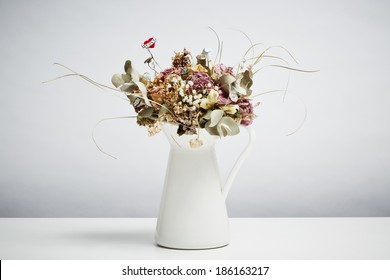 Bridal Flowers Dried In Vase On White Table Top