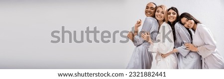 bridal party, four women, happy bride and bridesmaids in silk robes, cultural diversity, having fun together, friendship goals, brunette and blonde women, looking at camera, banner