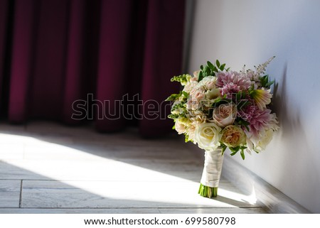 Bridal Wedding Bouquet on a grey wooden floor
