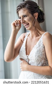 Bride Crying The Tears Of Joy And Laughing, Emotional On Her Wedding Day.