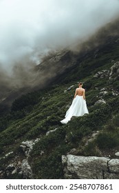 Bride in a dramatic high mountain scene