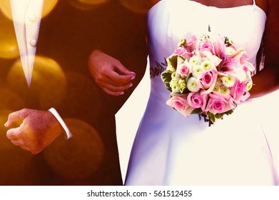 Bride And Father Arm In Arm