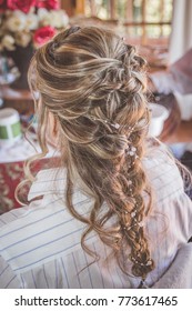 Bride With French Braid Hairstyle Wedding Hairdo With Pins And Curls Back View