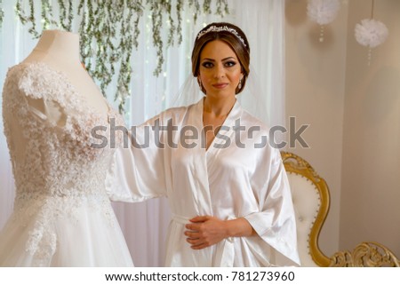 Bride getting dressed 
