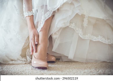 The Bride Getting Her Wedding Shoes On 