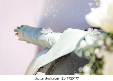 Bride getting ready, dressing, on her wedding day