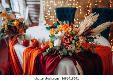 Bride And Groom Autumn Table With Decor And Flowers
