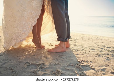 Bride And Groom At The Beach