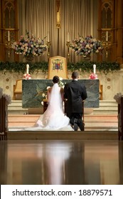 Bride And Groom At Church Wedding Alter Ceremony