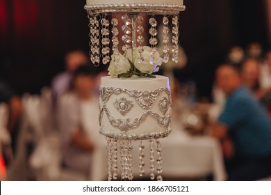 Bride And Groom Cut The Wedding Cake