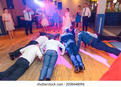 Bride And Groom Dancing The First Dance At Their Wedding Day. Guest On The Dancefloor