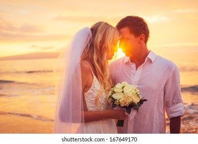 Bride and Groom, Enjoying Amazing Sunset on a Beautiful Tropical Beach, Romantic Married Couple Kissing