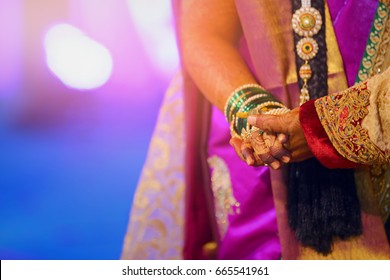 bride and groom hands , indian wedding