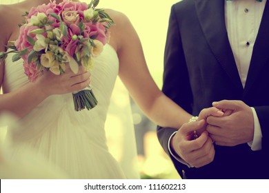 Bride And Groom Holding Hands