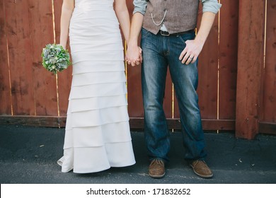 Bride And Groom Holding Hands