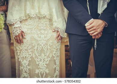 bride and groom at jewish wedding ceremony standing side by side