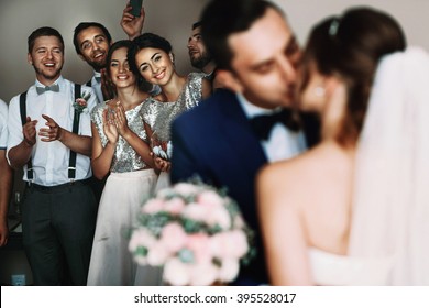 Bride & Groom Kissing, Bridesmaids & Groomsmen Cheering