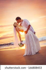Bride and Groom, Kissing at Sunset on a Beautiful Tropical Beach, Romantic Married Couple