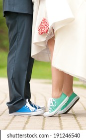 Bride And Groom' Legs In Color Gym Shoes, With Red-white Lollipop