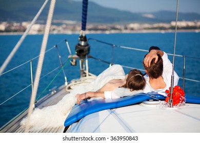 bride and groom on yacht