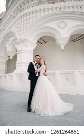 Bride and groom posing