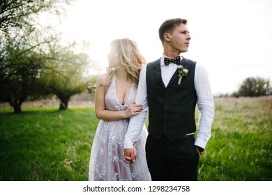 Bride and groom posing
