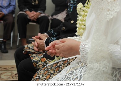 Bride And Groom Praying Together After Getting Married