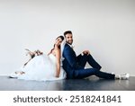 Bride, groom and smile mockup for marriage with flower bouquet, wedding and celebration together. Happy couple, unity and commitment for love, excited and portrait on floor and white wall background