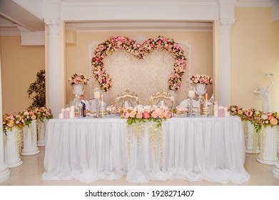 Bride And Groom Table Decorated With Beautiful Flowers