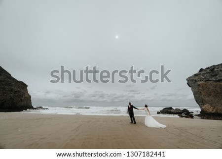 Similar – Image, Stock Photo Couple looking at the sea