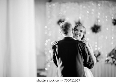 The bride and her father. Crying. Emotions. Dancing. Hugging. Black and white photo
