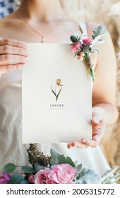 Bride Holding A Floral Card Mockup