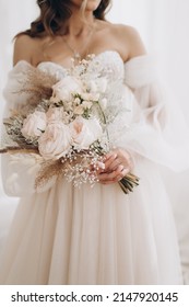 Bride Holding Gentle Wedding Bouquet