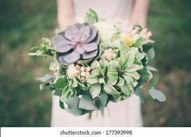 Bride Holding The Wedding Bouquet, With Succulent Flowers, Close-up