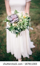 Bride Holding The Wedding Bouquet, With Succulent Flowers, Close-up